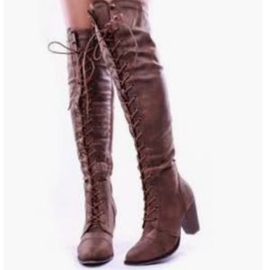 Lace up long combat style knee high boots